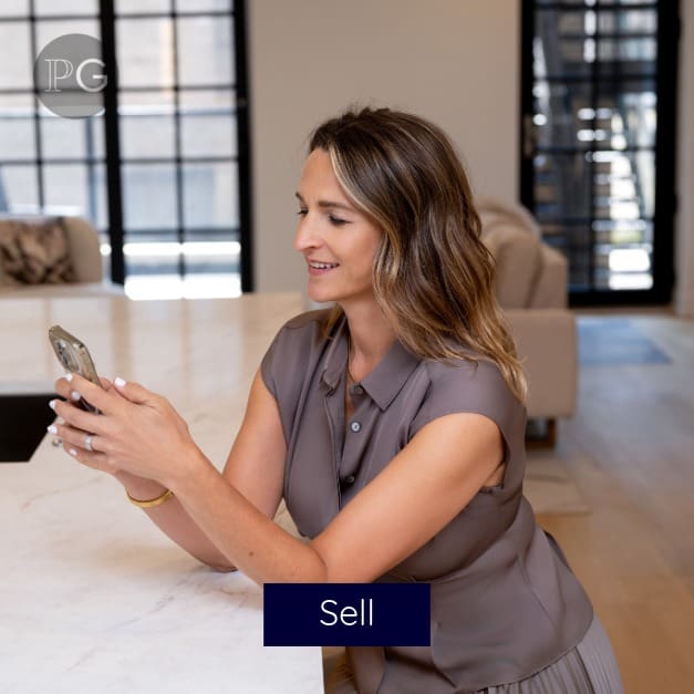 Square Tiles color-2 Samantha Porter is looking at phone